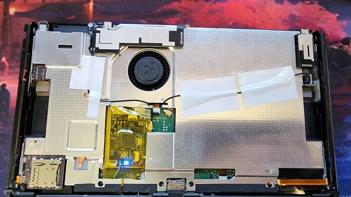 Nintendo Switch modchip installation on the console mainboard