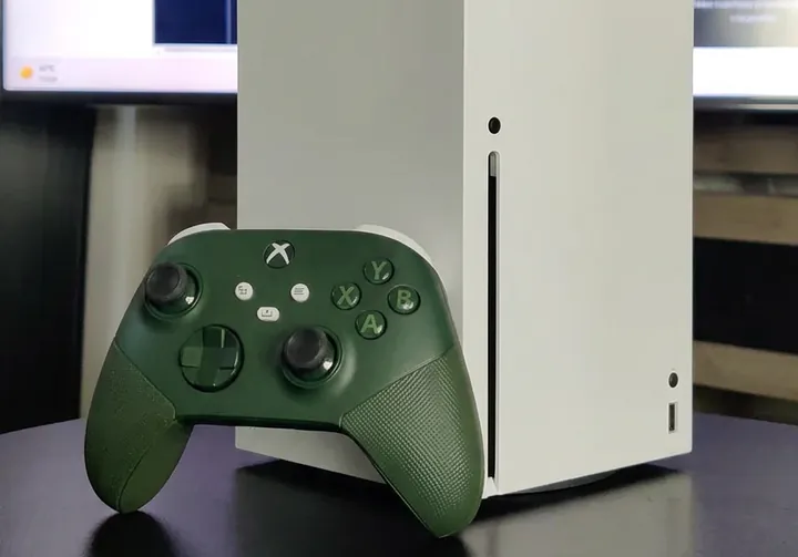 Xbox Series X controller with green rubberized custom shell swap replacing the white stock shell
